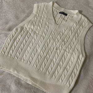 White sweater vest